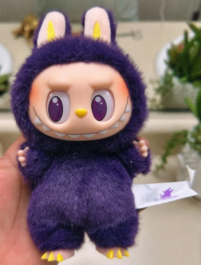 real life image of labubu in my hand